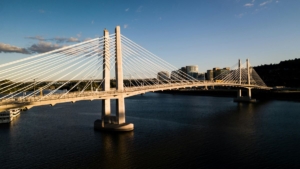 A view of Portland's newest bridge, Tillicum crossing spanning over the Wilamette River.
