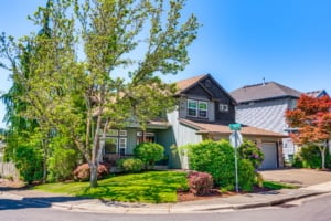 Charming single-family home with lush landscaping, perfect for Portland living and ideal for families or investors.