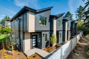 Modern single-family homes showcasing sleek exteriors, perfect for upscale Portland living and investment opportunities.