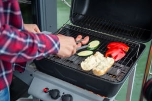 Grilling on a modern patio, showcasing outdoor entertaining space ideal for Portland single-family homes and lifestyle enjoyment.